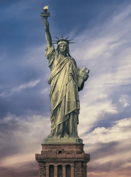 Close view of the Statue of Liberty against a cloudy sky